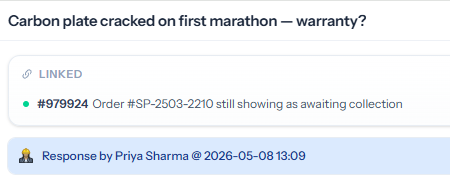 A ticket page showing the LINKED bar above the response thread with linked ticket #979924 and its subject