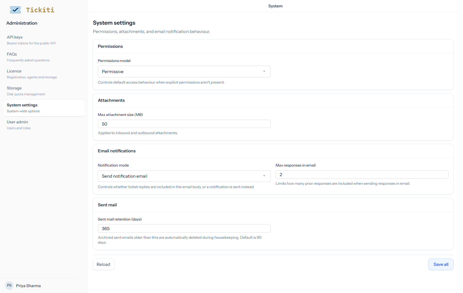 The System settings page with four cards: Permissions (Permissions model = Permissive), Attachments (Max attachment size 50 MB), Email notifications (Notification mode and Max responses in email), and Sent mail (Sent mail retention 365 days). Reload and Save all buttons at the bottom.