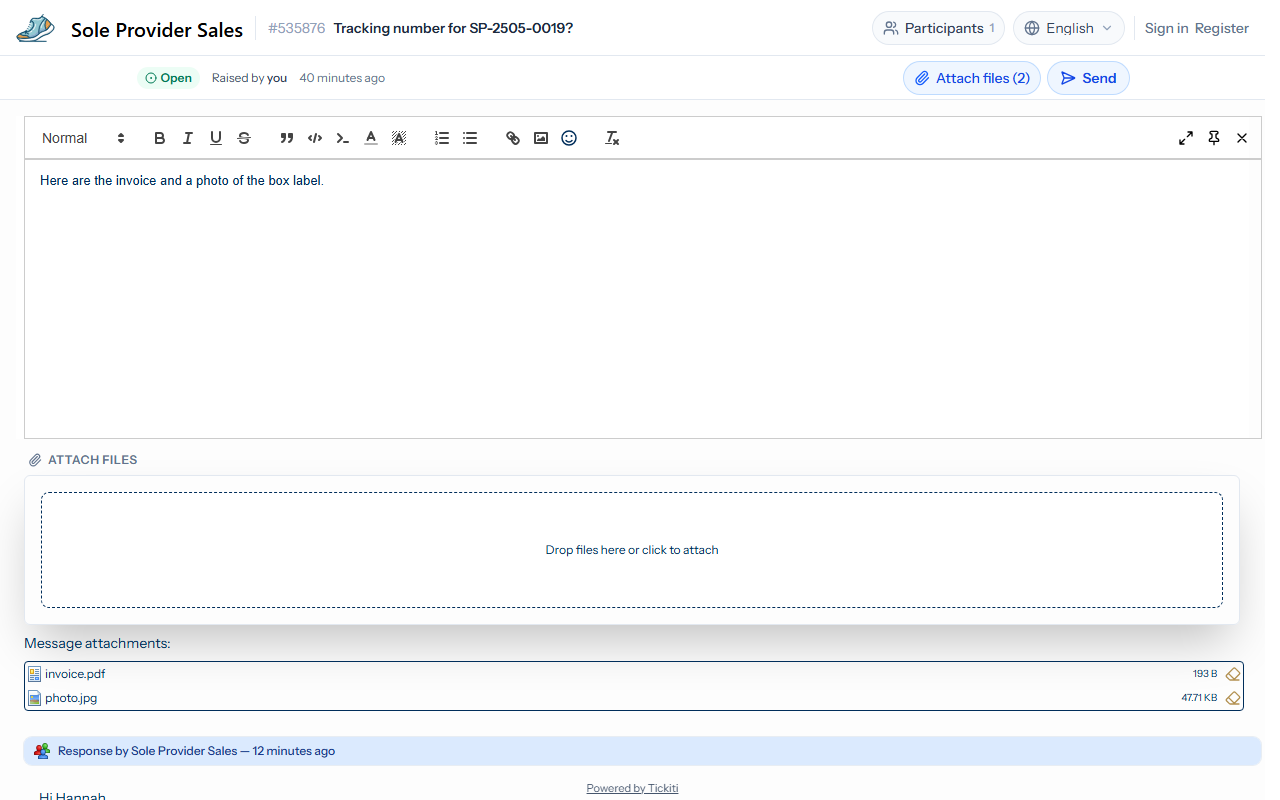 A reply open on a ticket, with the Attach files button showing a count of two, the dashed dropzone below the editor, and invoice.pdf and photo.jpg listed underneath